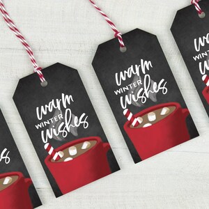May include: Black gift tags with the text "warm winter wishes" in white script. Each tag features a red mug of hot cocoa with marshmallows and a candy cane. The tags are strung with red and white twine.