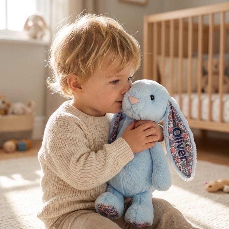 May include: A set of three ceramic mugs with a speckled, matte finish. The mugs are in shades of cream, light gray, and dark gray. Each mug has a simple, minimalist design, perfect for coffee or tea.