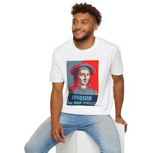 Könnte beinhalten: Weißes T-Shirt mit einer blauen und roten Grafik eines Mannes mit dem Text "JOSQUIN for DES PREZ".
