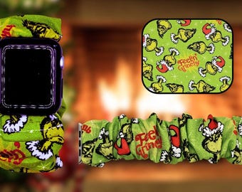 Pulsera inteligente con coletero de tela con temática navideña de hombre verde malvado