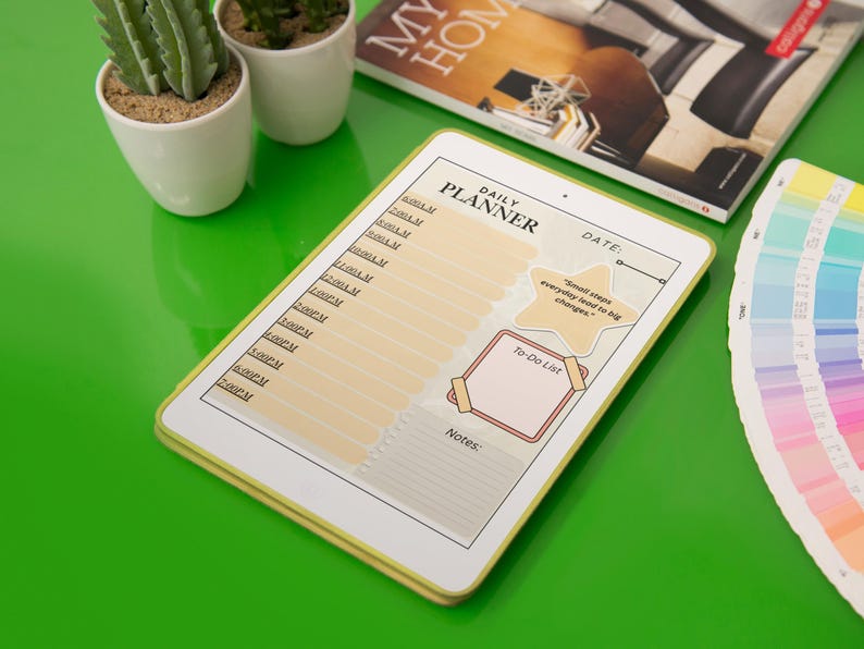 May include: A digital daily planner with a yellow border, featuring a schedule, to-do list, and notes section. The planner includes the text "DAILY PLANNER" and a quote. The image also includes a color swatch and small potted plants.