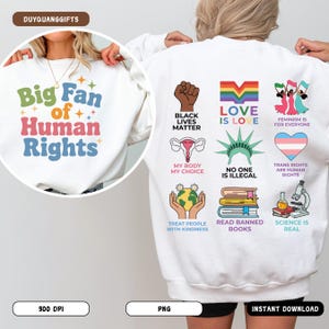 May include: White sweatshirt with the text "Big Fan of Human Rights" on the front. The back features various graphics and phrases, including "Black Lives Matter," "Love is Love," and "Trans Rights are Human Rights."
