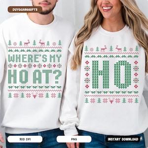 May include: White sweatshirts with Christmas designs. One features the text "WHERE'S MY HO AT?" in green and red, the other says "HO" in green. Both have festive patterns of trees, reindeer, and snowflakes.