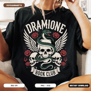 May include: Black t-shirt featuring a graphic design with the word "DRAMIONE" above a skull with a green snake, wings, and roses. The words "BOOK CLUB" are on a banner below the skulls. The shirt is a PNG and SVG instant download.