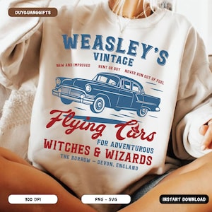 May include: Cream-colored sweatshirt featuring a blue vintage car graphic with the text "WEASLEY'S VINTAGE Flying Cars" in blue and red. Additional text includes "NEW AND IMPROVED" and "WITCHES & WIZARDS". The design is reminiscent of a retro advertisement.