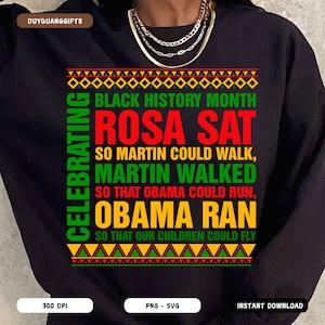 May include: Black and red graphic design on a black t-shirt that reads "Celebrating Black History Month Rosa Sat So Martin Could Walk, Martin Walked So That Obama Could Run, Obama Ran So That Our Children Could Fly".