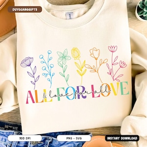 May include: A white sweatshirt with a rainbow design featuring flowers and the text "ALL for all & love for all LOVE".