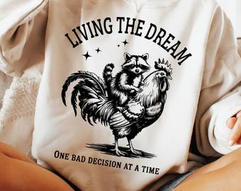 Living the Dream PNG SVG, Funny Raccoon Rooster Shirt PNG, Sarcastic Animal Humor Design, Farm Animal Sublimation, Quirky Animal Png