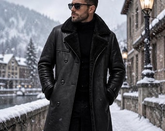 May include: A black leather coat with a shearling collar and lining. The double-breasted coat has a long length and is worn in a snowy outdoor setting. The person is wearing sunglasses and a black turtleneck.