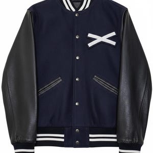 May include: Navy blue varsity jacket with black leather sleeves. The jacket features a white "X" patch, two front pockets, and a striped collar, cuffs, and hem. The jacket has a button-up closure.