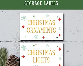 May include: Printable Christmas storage labels with a white background and red, green, and blue snowflakes and stars. The labels say "Christmas Ornaments" and "Christmas Lights".