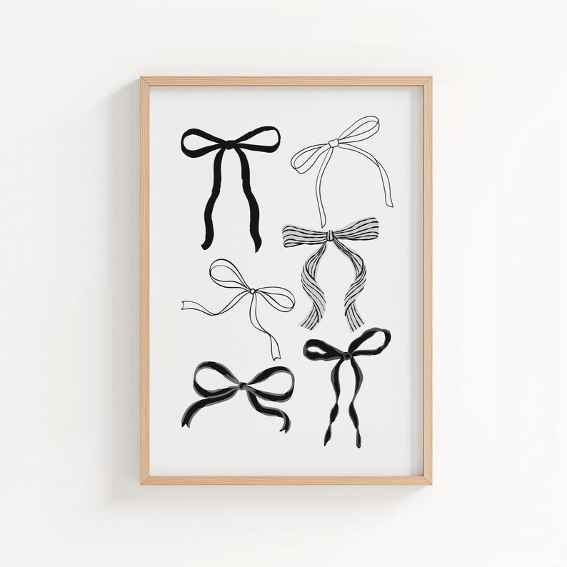 May include: A framed print featuring six different black and white bow illustrations. The bows vary in style, from simple tied bows to more elaborate designs. The artwork is set against a white background, framed in a light wood.
