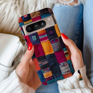 Textured Knit Squares Pixel Case adds bright boho charm with blue, pink, orange and mustard knit patches - cozy, playful daily cover.