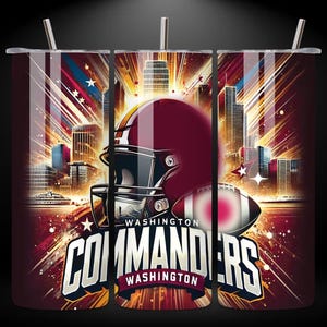 May include: A stainless steel tumbler with a design featuring the Washington Commanders logo, a football helmet, and a cityscape. The tumbler is red, white, and gold with a black background. The text "Washington Commanders" is printed on the tumbler.