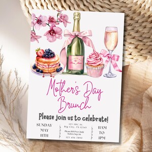 May include: A pink and white Mother's Day brunch invitation with a watercolor illustration of a champagne bottle, a cupcake, a plate of pancakes with blueberries, and a glass of champagne. The text reads "Mother's Day Brunch" and "Please join us to celebrate!" with the date and time of the event.