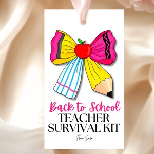 May include: A white gift tag featuring a colourful illustration of a bow made from a pencil and a crayon, topped with a red apple. The tag reads "Back to School Teacher Survival Kit" in pink and black text.