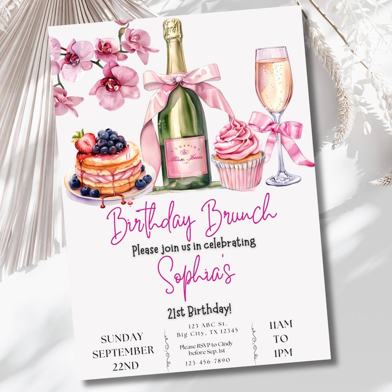 May include: A pink and white birthday brunch invitation with a watercolor illustration of a champagne bottle, a glass of champagne, a cupcake, and a stack of pancakes with berries. The text on the invitation reads "Birthday Brunch", "Please join us in celebrating Sophia's 21st Birthday!" and includes the date, time, and location of the event.