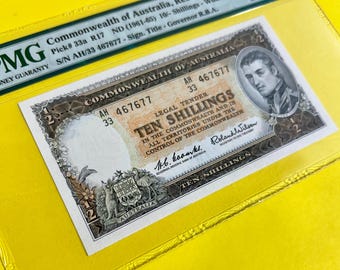 10 SHILLINGS. N D 1961-65. Commonwealth of Australia. Reserve Bank, Legal Tender. Serial# AH/33 467677. Matthew Flinders. 55 P M G GRADED.