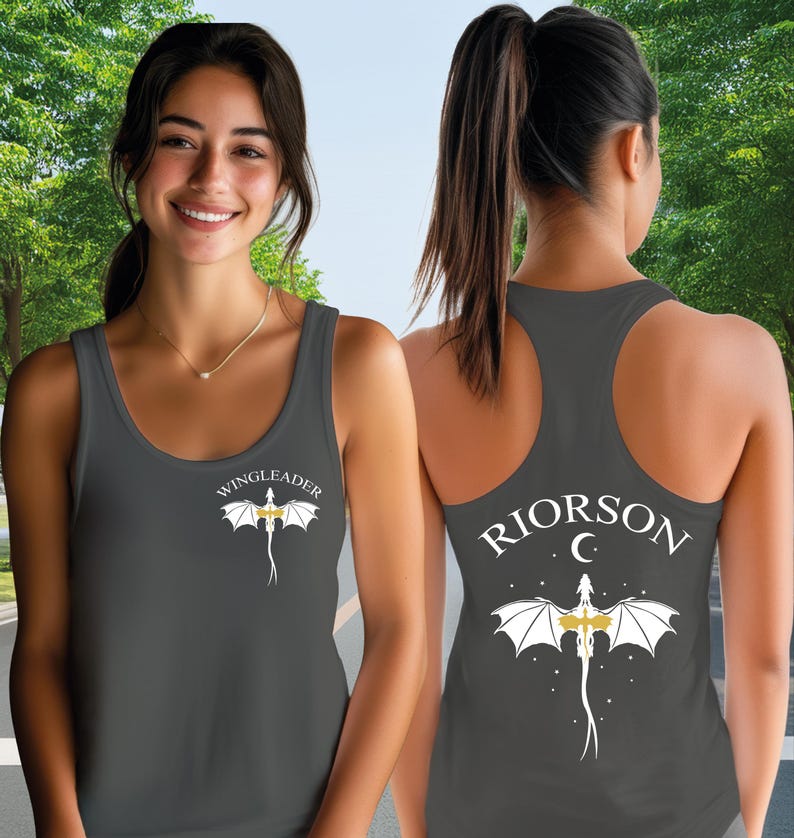 A woman wearing a gray tank top with a dragon design and the text "WISCLEADERRION C" printed on the back.