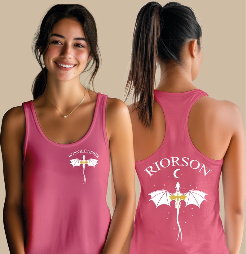 A woman wearing a pink tank top with a dragon design and the text "WINGLEADERRI" printed on it.