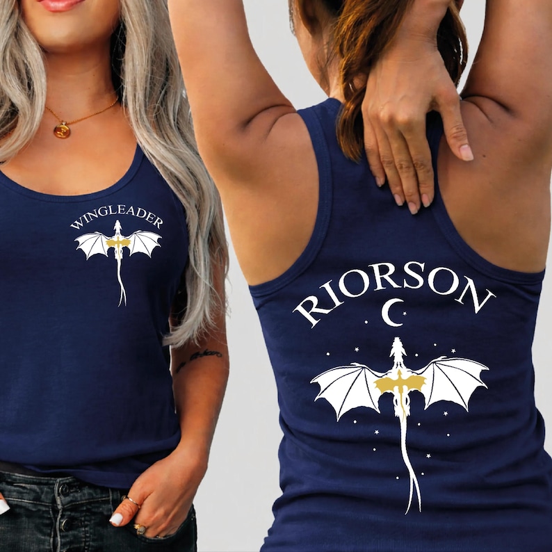 A woman wearing a navy blue tank top with a dragon design and the text "VINGLEADER" printed on it.