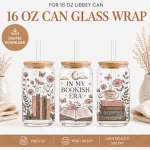 May include: Three clear 473 ml glass can wraps with bamboo lids and straws. Each wrap features a different design with floral and book-themed illustrations. One says "In My Bookish Era". Another says "Just One More Chapter".