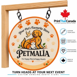 Peut inclure: Un panneau rond suspendu avec une bordure orange fixé à un bras en bois. Le panneau présente un golden retriever et un chat, le texte "Your Pet's Favourite Store", "PETMALIA" et "For Happy Pets & Happy Hearts" avec des empreintes de pattes.