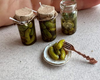 Miniature for a dollhouse cucumbers. The scale is 1 to 12