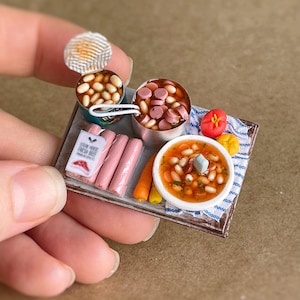 Miniature set with beans and sausages on a scale from 1 to 12