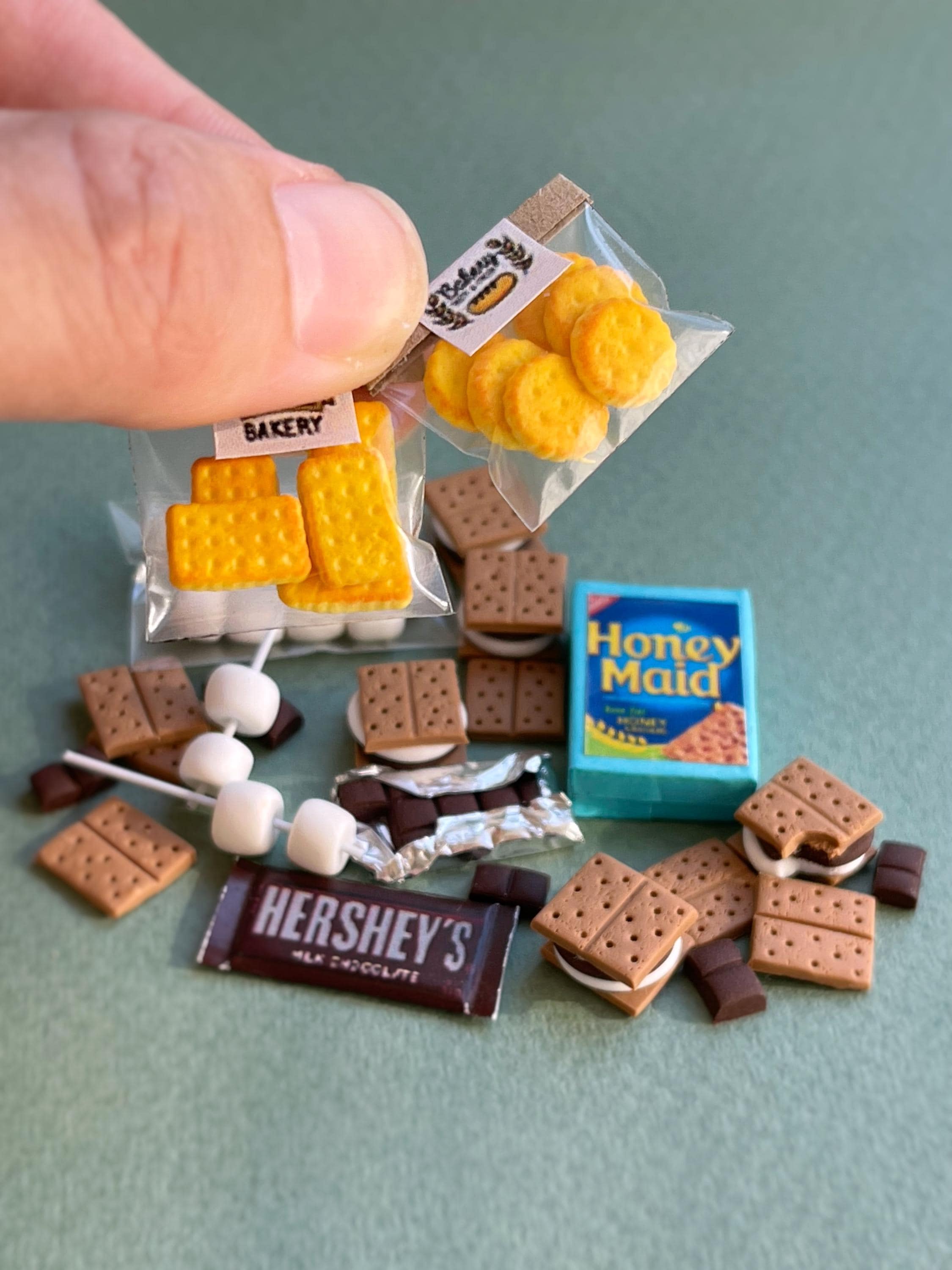 Miniature set with cookies and marshmallows on a scale from 1 to 12