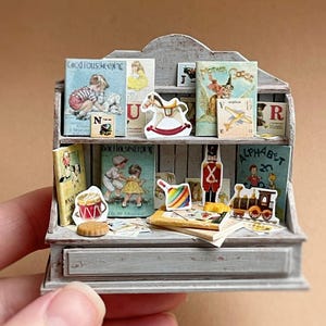 Miniature childrens set, for a dollhouse and games with dolls, size 1:12