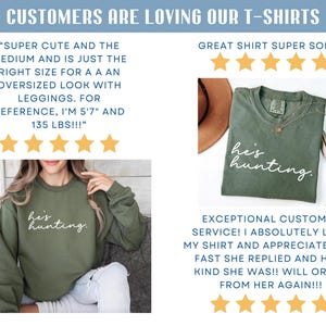 May include: Two photos of a green t-shirt with the text "he's hunting." in white. The first photo shows a woman wearing the t-shirt. The second photo shows the t-shirt laid flat. Both photos include five-star reviews.