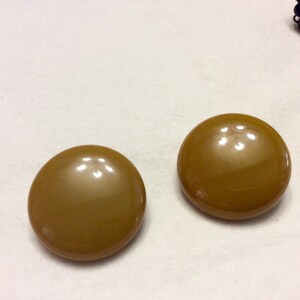 Vintage butterscotch bakelite clip on earrings.