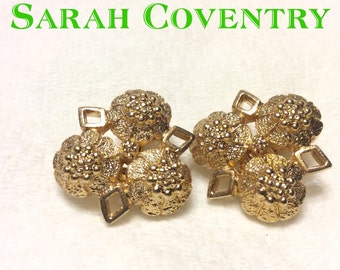 Sarah Coventry gold metal cluster clip on earrings. 1970's.
