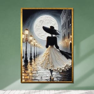 May include: A woman in a black dress and hat walks down a cobblestone street at night. The street is lined with lampposts and there is a full moon in the sky.