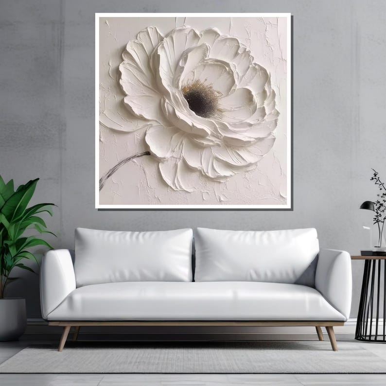 May include: A white flower with a textured, 3D effect. The flower is painted on a white canvas with a light pink background.