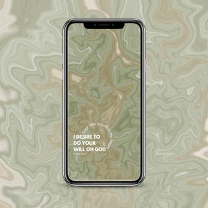 Może przedstawiać: Ekran telefonu z tłem w kolorze zielonym i brązowym marmuru. Tekst "Your law is within my heart. I desire to do your will oh God. Psalm 40:8" znajduje się w kółku na ekranie.
