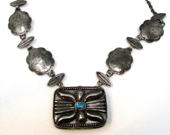 Vintage Estee Lauder Silverplate Southwestern Necklace 1973 Vintage Estee Lauder Youth-Dew solid perfume necklace Native Conch Style