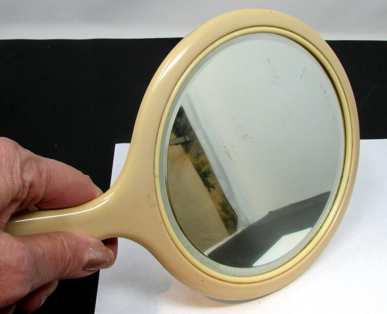 ivory pyralin hand mirror