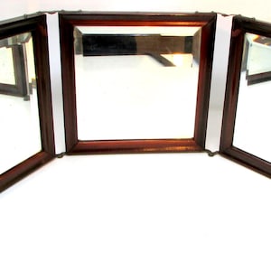 Vintage Tri Fold Vanity Mirror with Beveled Glass and Embossed Floral Backing Art Nouveau Design Shaving Mirror