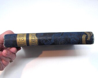 Livro antigo 'Lucile' – Romance em versos de Owen Meredith, 1888, com páginas douradas.