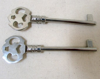 Antique Skeleton Keys Heavy Silver Metal Vintage Keys lot of 2 Great for jewelry collections Over 4 inches long