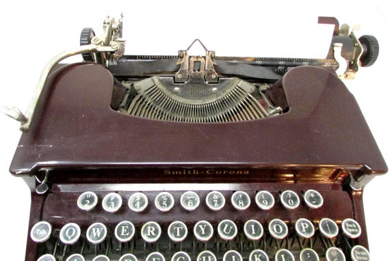 Vintage Smith-Corona Portable Manual Typewriter – Burgundy Finish, Glass Keys Movie Prop
