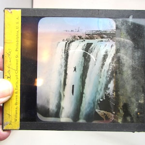 10 Antique Magic Lantern Slides – Niagara Falls Daredevil Series + Landscapes – Hand-Colored Glass, ca. 1880–1910 Vintage glass slides