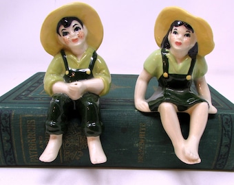 Vintage Shelf Sitters Mid Century Boy Fishing with Farm Girl   MCM Ceramic Arts Studio Farm Boy and Girl Shelf Sitter Pair of Shelf Sitters