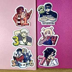 May include: A collection of colorful anime-style stickers featuring characters with numbers. The stickers include characters with the numbers 1, 2, 3, 4, 5, 6, and 7. The sticker designs have a variety of poses and expressions.