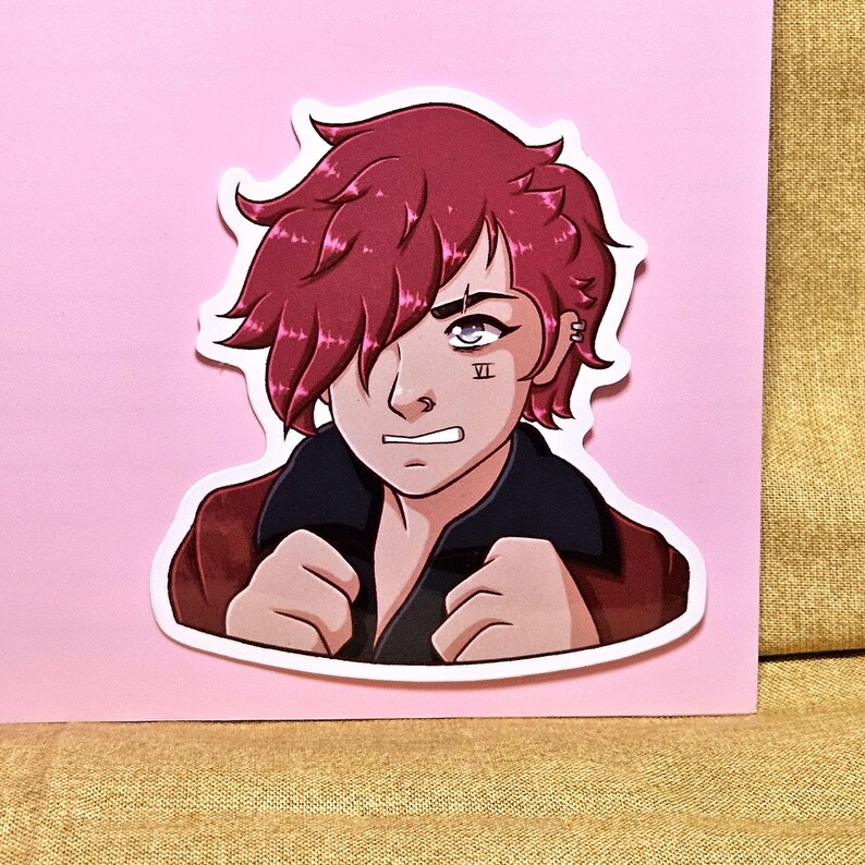May include: A sticker featuring a stylized illustration of a character with red hair and a determined expression. The character wears a red jacket with a black collar and has a tattoo on their face. The sticker is on a pink background.