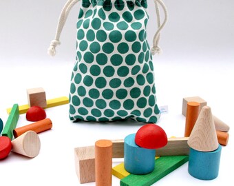 Bags of wooden shapes made in the Jura region - "green and dots''