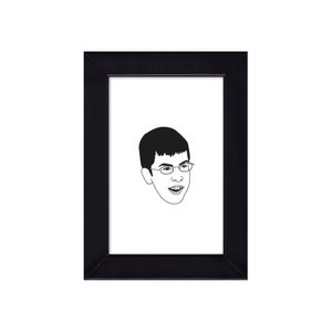 May include: A black framed portrait featuring a black and white line drawing of a person's face. The person is wearing glasses and has short hair. The portrait is set against a white background.