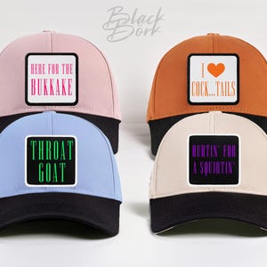 May include: Four baseball caps in various colors: pink, orange, light blue, and beige. Each cap has a black brim and a square patch with text. The text on the patches includes phrases like "HERE FOR THE BUKKAKE" and "THROAT GOAT".